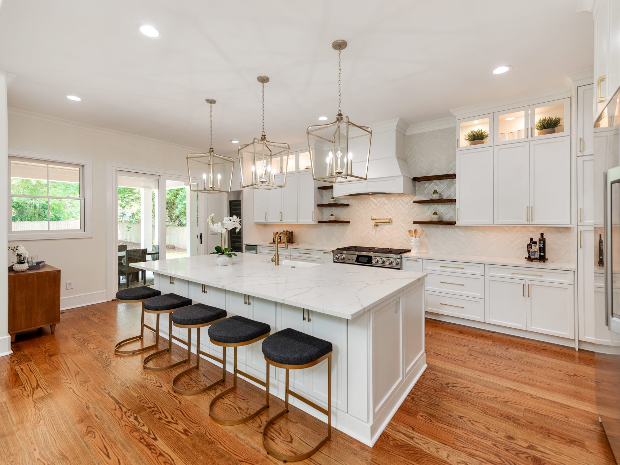 Kitchen island with counter-height bar seating — Brantham by Stillman Properties Charlotte NC