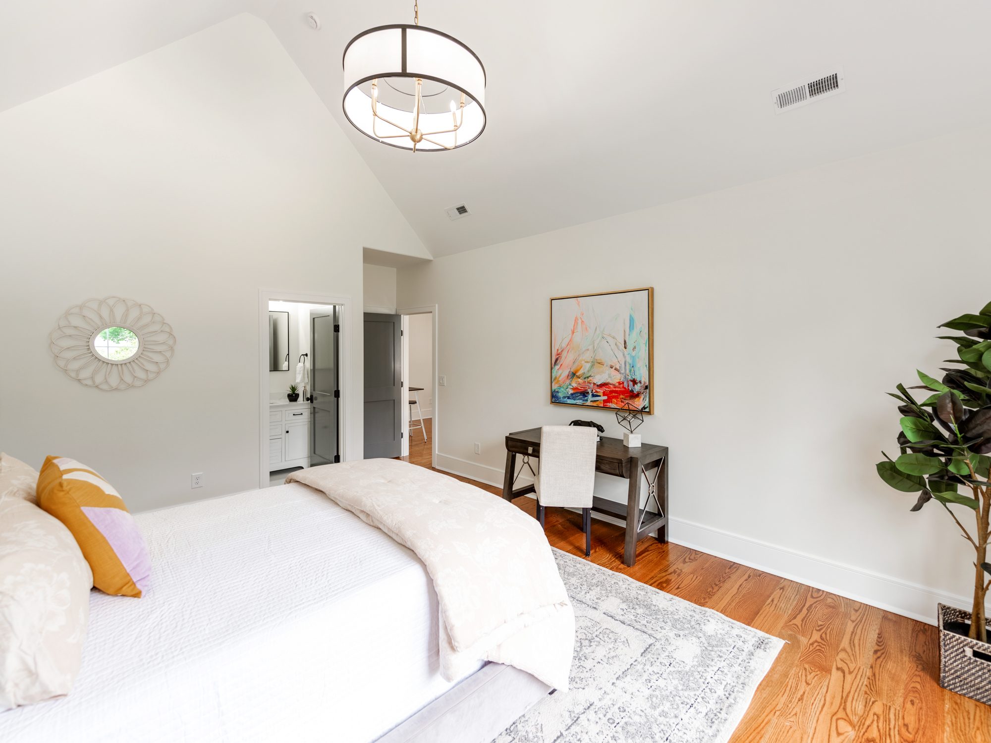 Guest bedroom from alternate angle with rug and nightstand detail — Brantham by Stillman Properties Charlotte NC