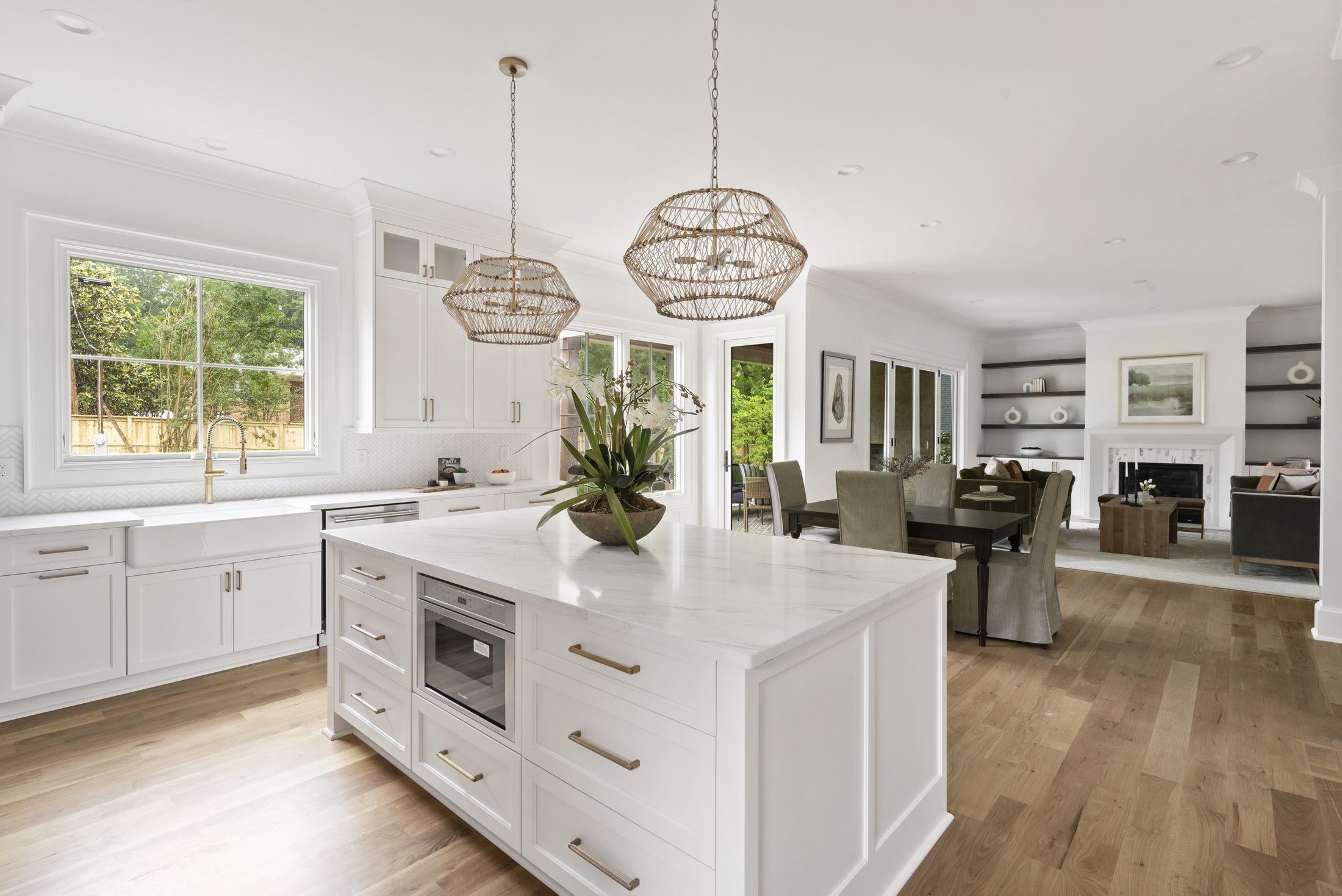 Kitchen island and breakfast area open to the dining and living spaces — Bywood by Stillman Properties Charlotte NC