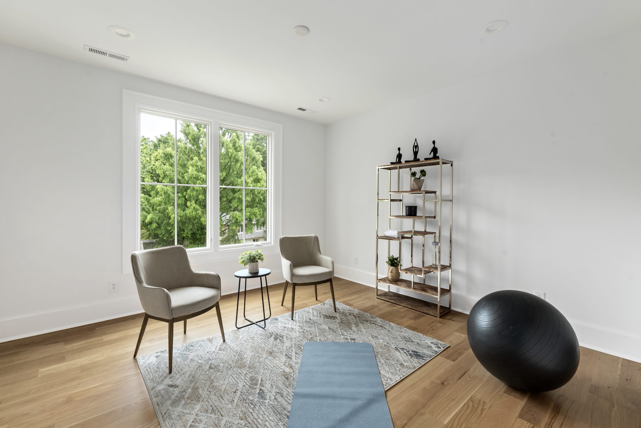 Flexible bonus room set up as a yoga and workout space with white oak floors — Bywood by Stillman Properties Charlotte NC