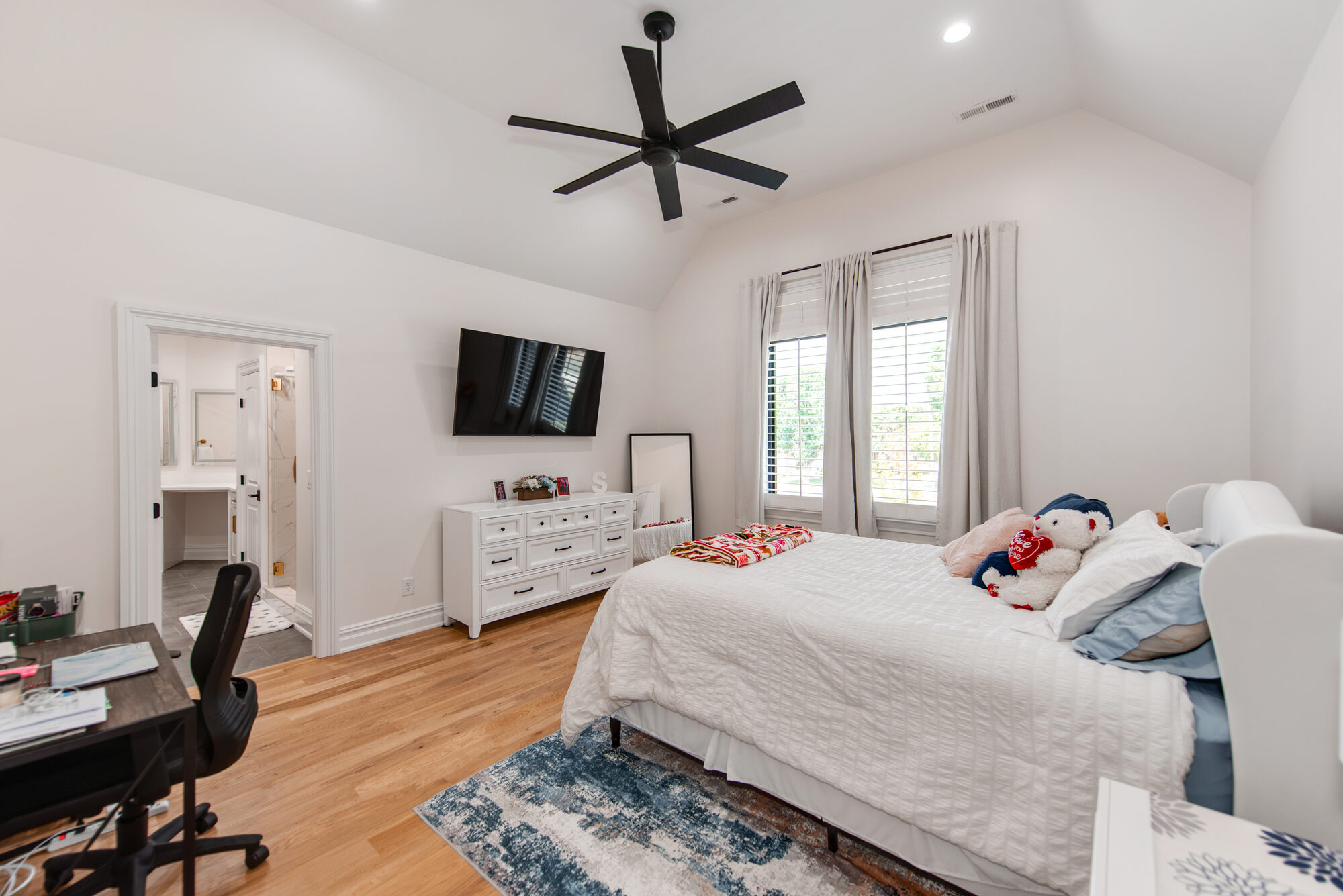 Guest suite with vaulted ceiling and en-suite access — Coddle Creek by Stillman Properties Concord NC