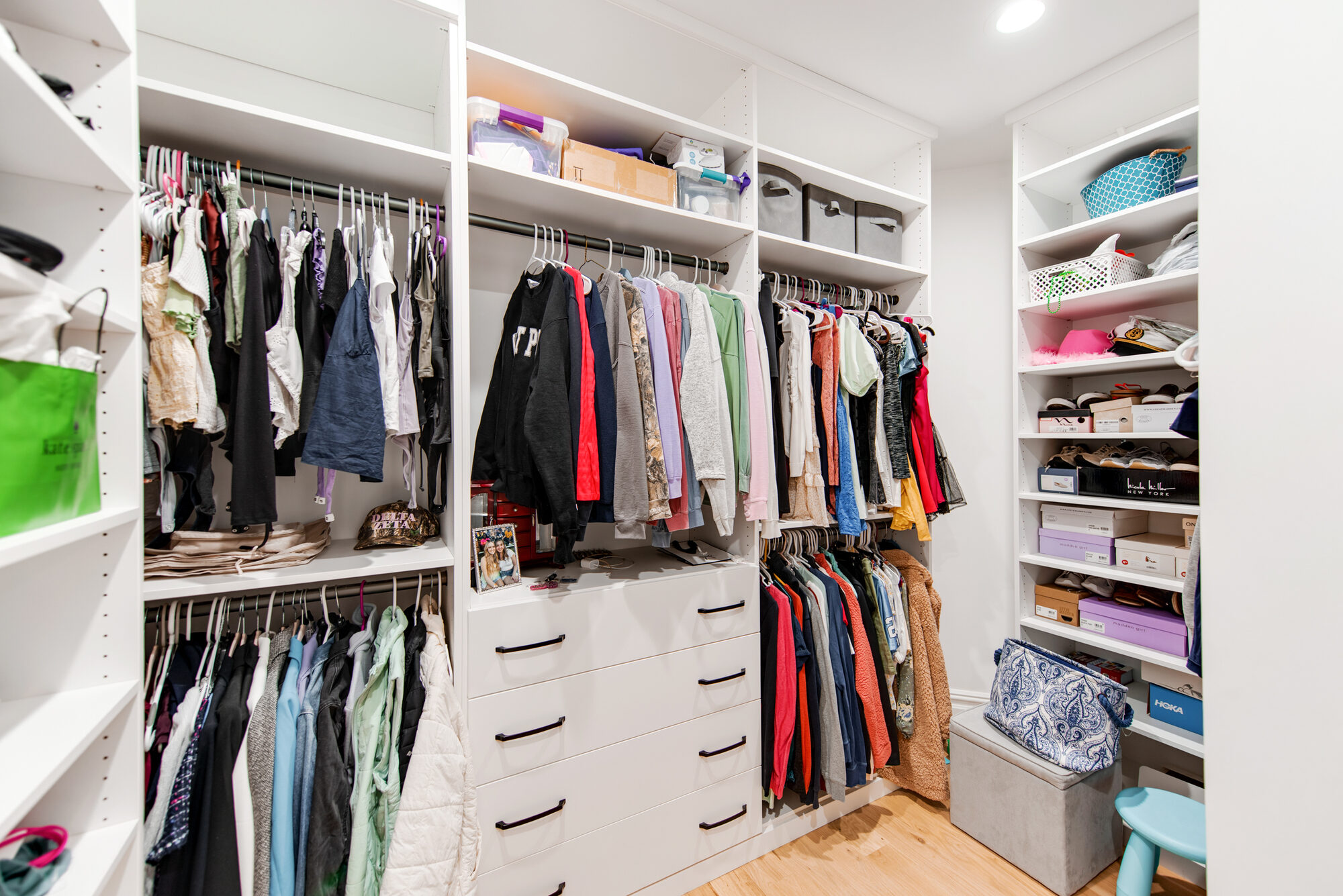 Second guest closet with built-in drawers and bin storage — Coddle Creek by Stillman Properties Concord NC