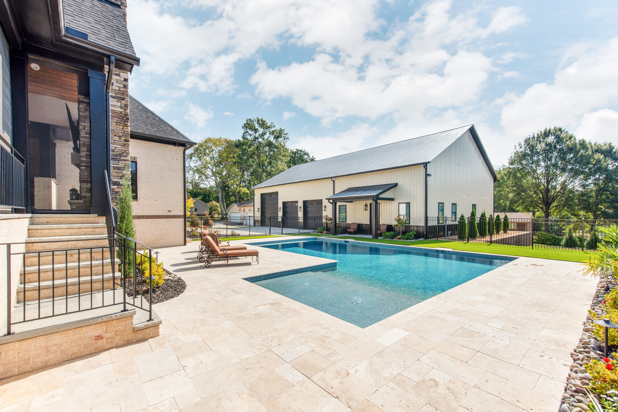 Full estate context shot with main residence, pool with sunken hot tub, and barndominium garage — Coddle Creek by Stillman Properties Concord NC