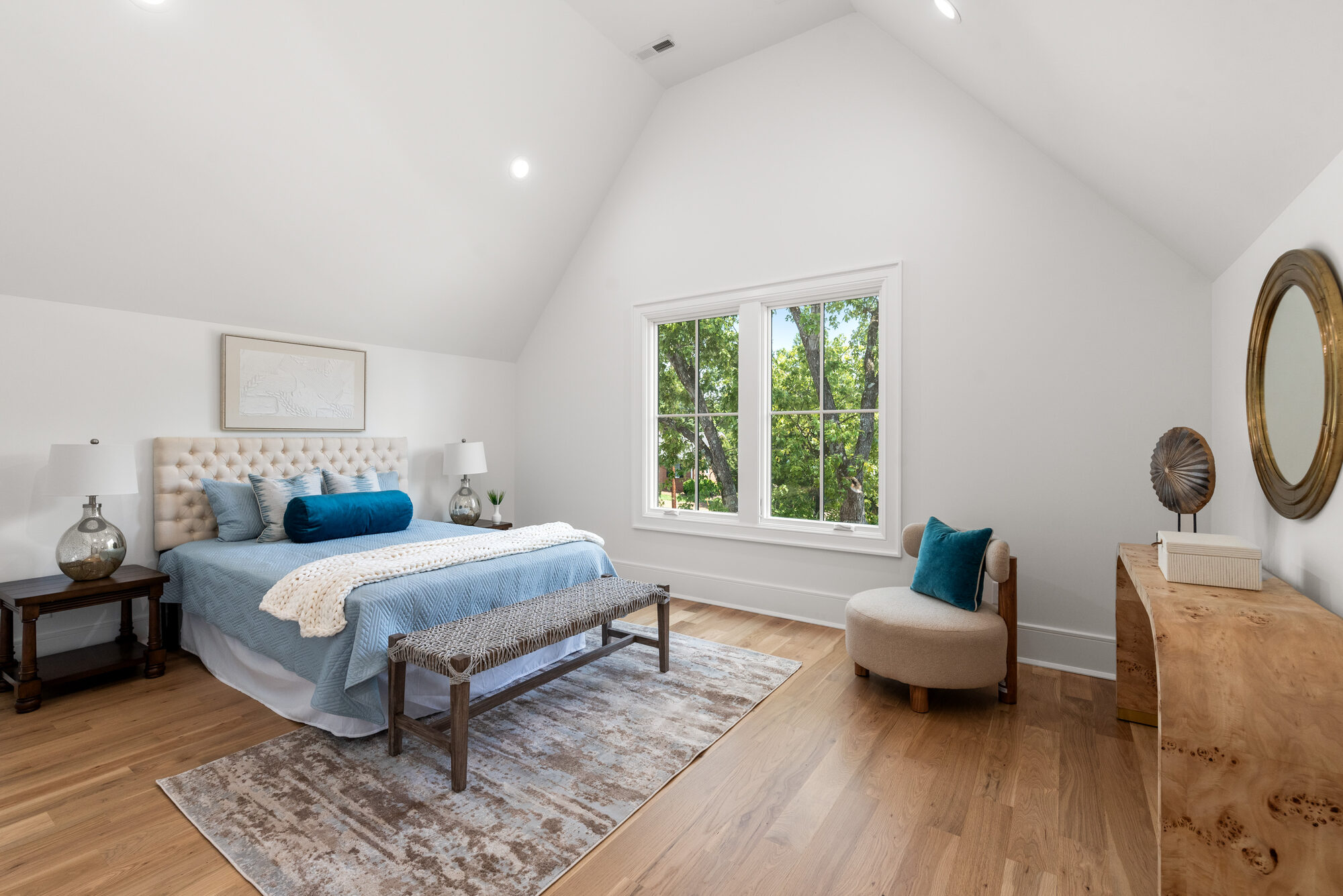 Walker guest bedroom with vaulted ceiling and burl-wood console — Stillman Properties Cotswold Charlotte NC
