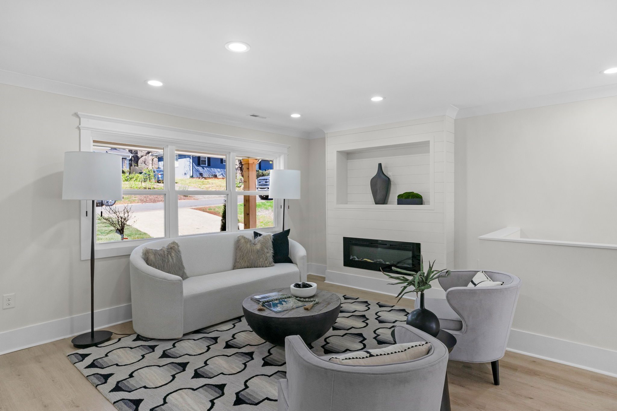 Living room with new windows overlooking the front yard — Wyanoke by Stillman Properties Charlotte NC