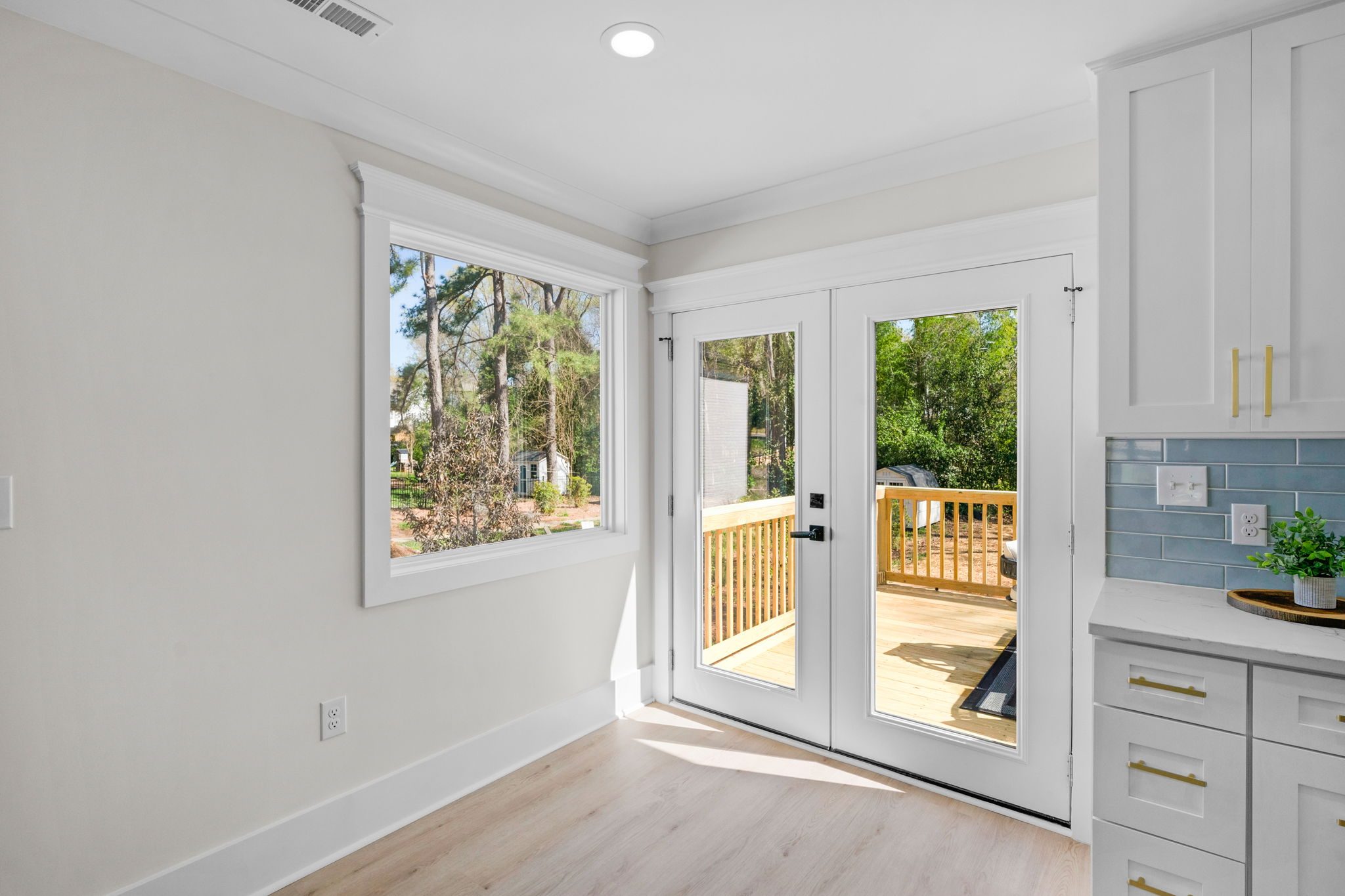 Kitchen cabinetry and counter detail by the rear entry doors — Wyanoke by Stillman Properties Charlotte NC
