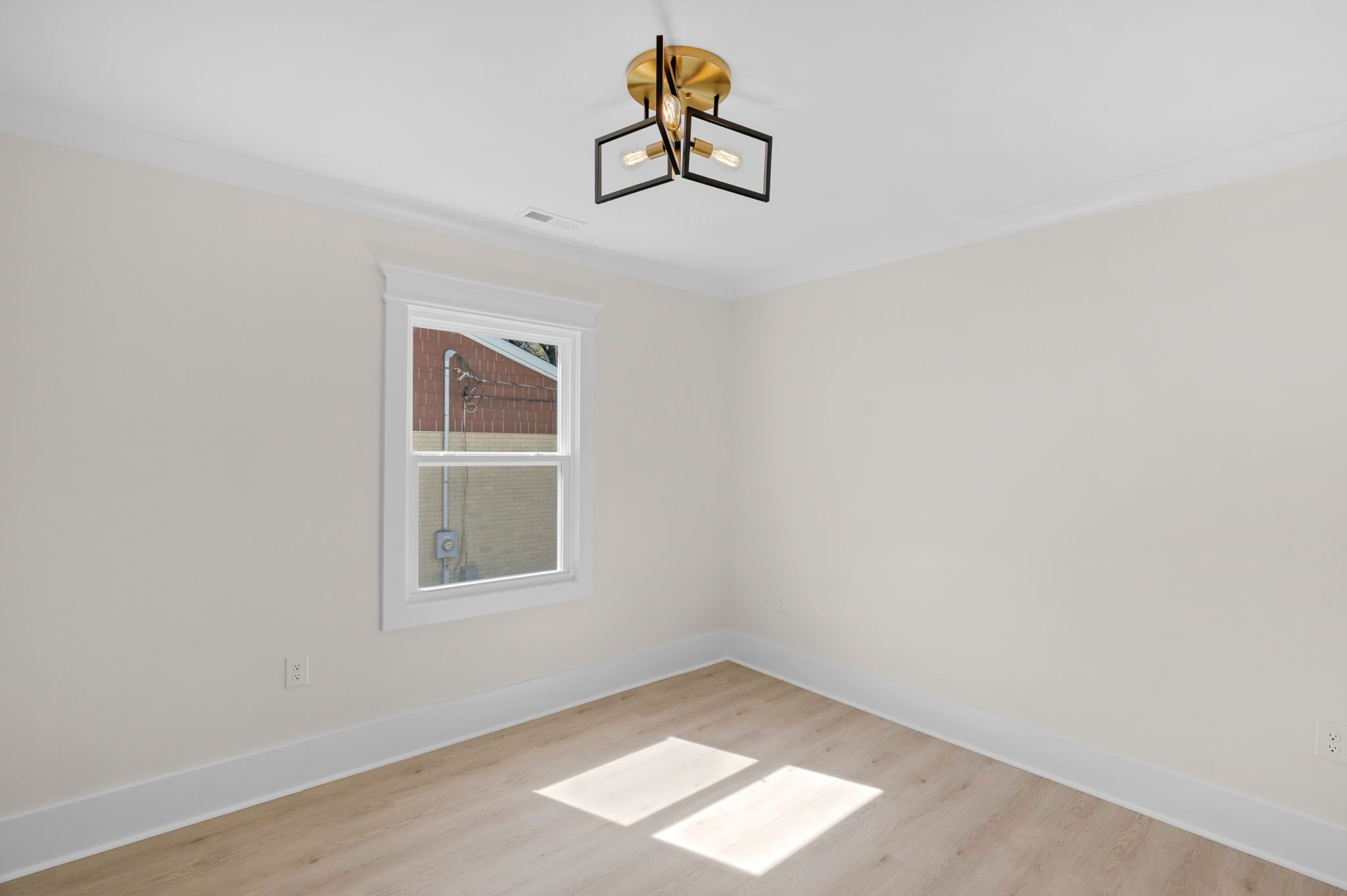 Secondary bedroom with new windows and refinished flooring — Wyanoke by Stillman Properties Charlotte NC